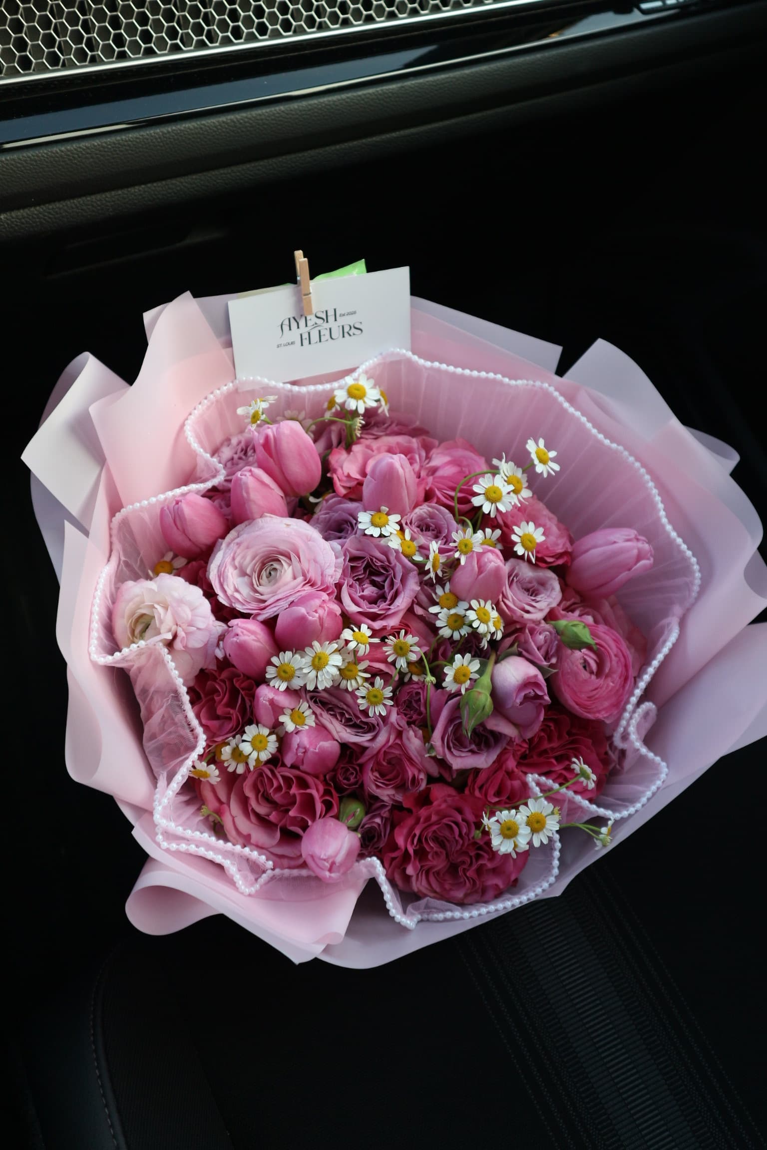 Pink roses, ranunculus and tulips with chamomile daisies in pearl-trimmed pink wrap, Ayesh Fleurs card