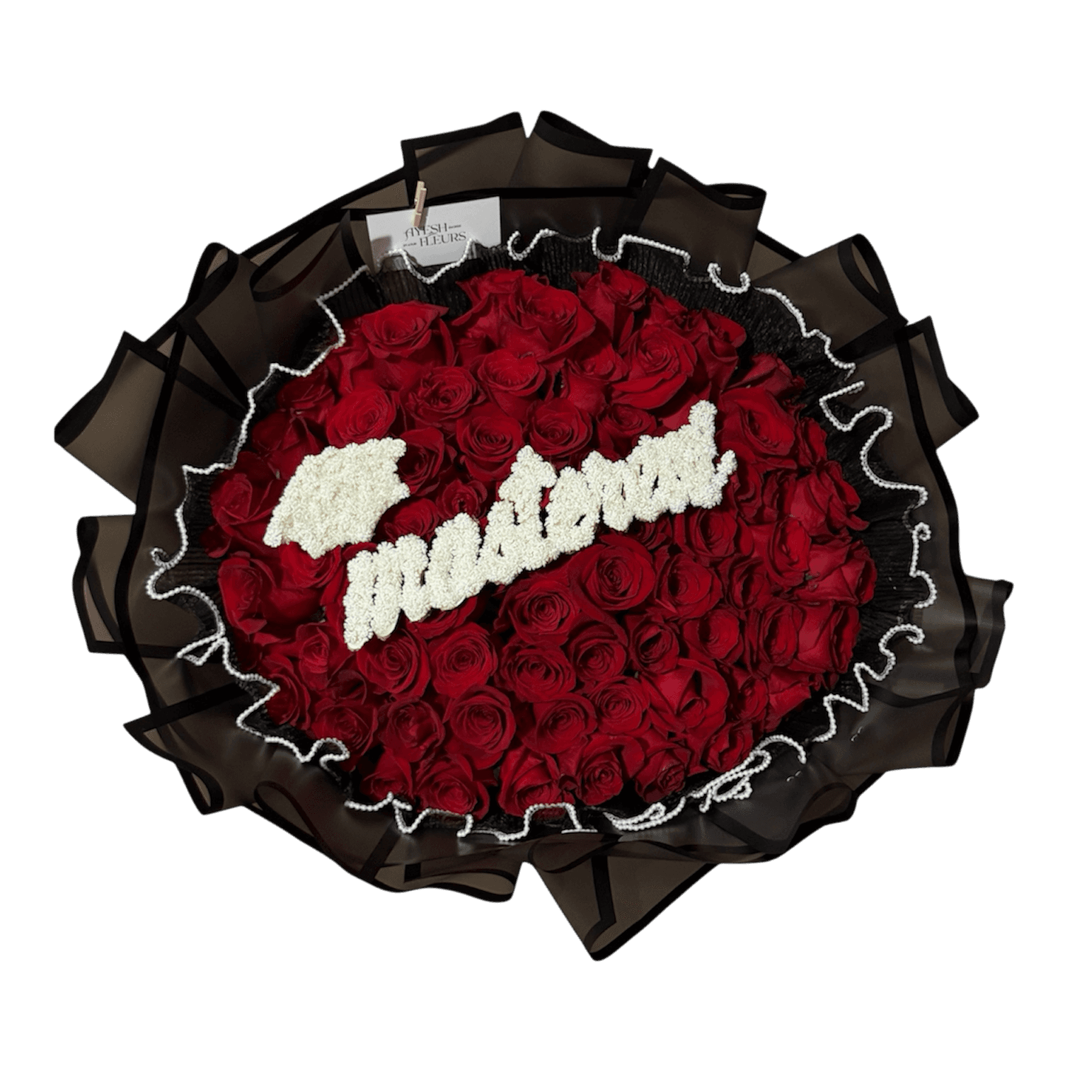 Deep red roses arranged in a heart box for romance